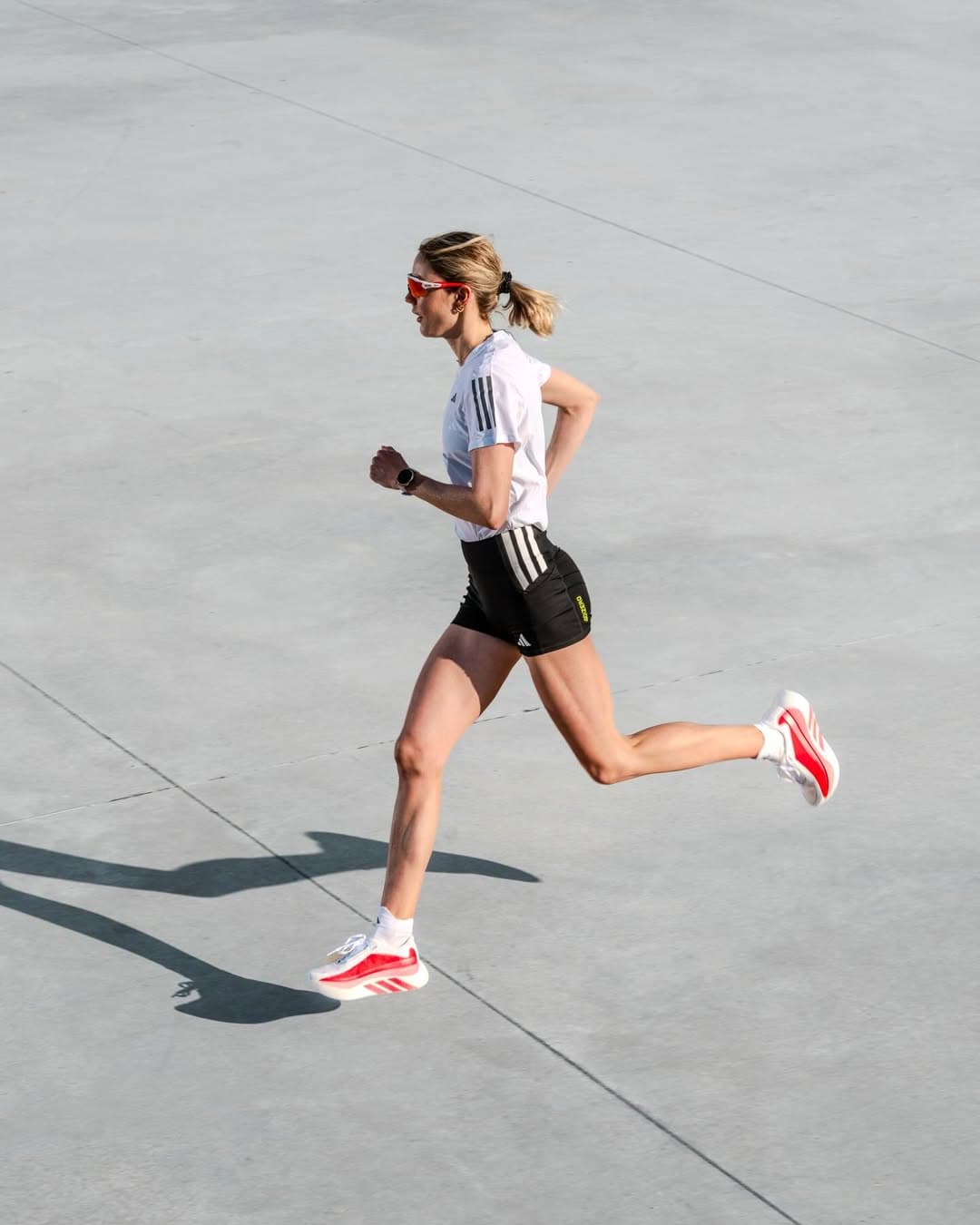 Mid-stride run, captured in motion.